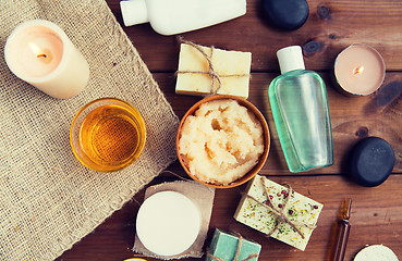 Image showing close up of body care cosmetic products on wood