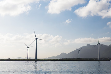 Image showing turbines at wind farm on sea shore