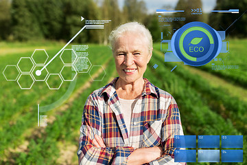 Image showing happy senior woman at farm