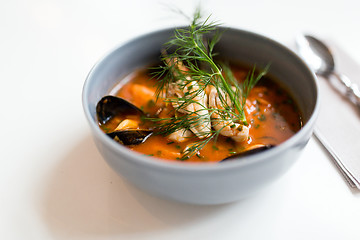 Image showing seafood soup with fish and blue mussels in bowl