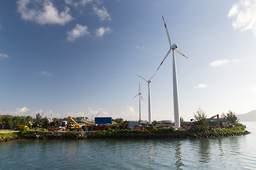 Image showing turbines at wind farm on sea shore