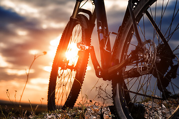 Image showing Mountain bike against sunset