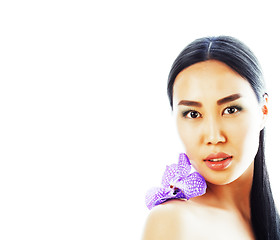 Image showing young pretty asian woman with flower orchid close up isolated sp