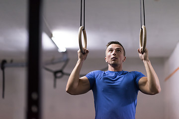 Image showing man doing dipping exercise