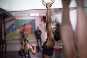 Image showing black woman doing dipping exercise