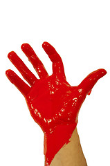 Image showing Red paint on hand