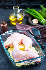 Image showing raw chicken legs and potato 