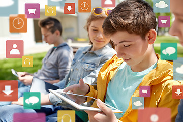 Image showing happy friends or students with tablet pc outdoors