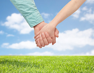 Image showing happy father and child holding hands