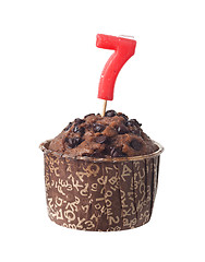 Image showing Chocolate muffin with birthday candle for seven year old