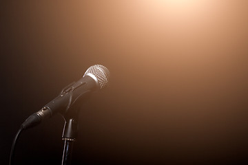 Image showing Microphone in light of spotlight