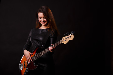 Image showing Photo of girl with guitar