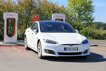 Image showing New White Tesla Model S Electric Car Charging 