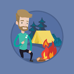 Image showing Businessman roasting marshmallow over campfire.