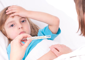 Image showing Sick little girl in bed