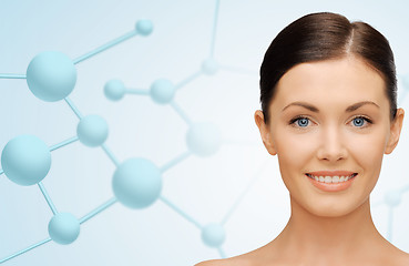 Image showing beautiful young woman face with molecules