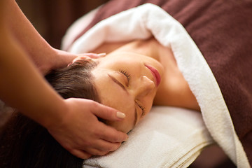 Image showing woman having head massage at spa