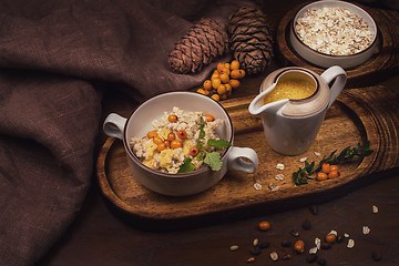 Image showing oatmeal with sea buckthorn