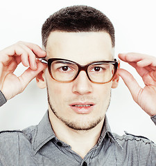 Image showing young handsome well-groomed guy posing emotional on white background, lifestyle people concept 