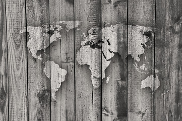 Image showing Map of the world on weathered wood