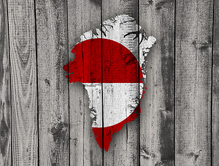 Image showing Map and flag of Greenland on weathered wood