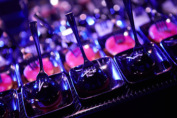 Image showing Beautifully decorated catering banquet table with different food snacks.