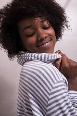 Image showing beautiful black woman wearing  bathrobe