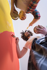 Image showing couple painting interior wall