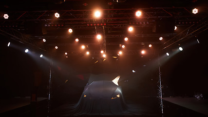 Image showing Close up of a new car hidden under cover.