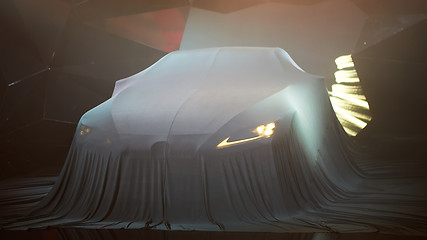 Image showing Close up of a new car hidden under cover.