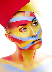 Image showing woman with creative geometry make up, red, yellow, blue closeup 