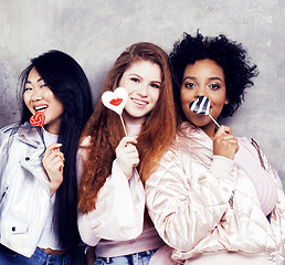 Image showing Lifestyle and people concept: young pretty diversity nations woman with different age children celebrating on birth day party together happy smiling, making selfie. African-american, asian and caucasi