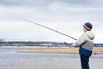 Image showing boy on the fishing