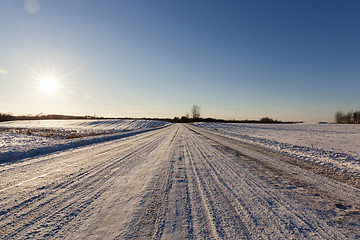 Image showing traces of the car on snow