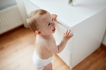 Image showing close up of happy little baby boy or girl at home