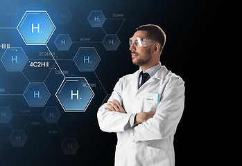 Image showing scientist in lab goggles chemical formula