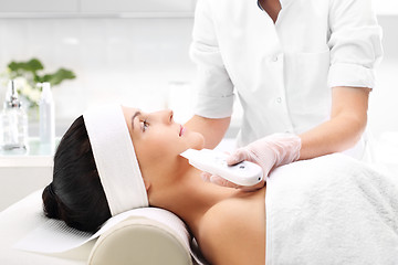 Image showing The woman's face during a facial at a beauty salon