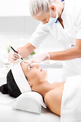 Image showing Relaxed woman during a microdermabrasion treatment in beauty salon