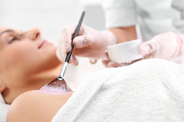 Image showing Face mask with algae applied to the neckline. Care treatment for neck and shoulders.