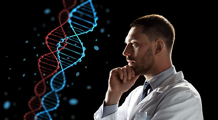 Image showing doctor or scientist looking at dna molecule