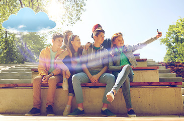 Image showing happy teenage students taking selfie by smartphone