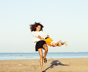 Image showing pretty diverse nation and age friends on sea coast having fun, lifestyle people concept on beach vacations close up