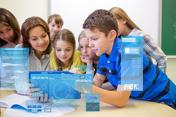 Image showing group of kids with teacher and tablet pc at school