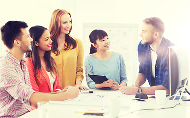 Image showing happy creative team or students working at office