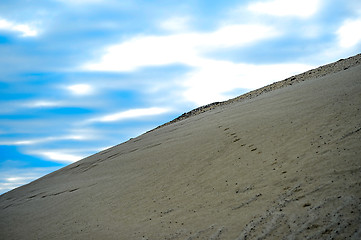 Image showing Sandy hill in a quarry against the sky