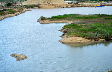 Image showing Extraction of sand, sand pit with water