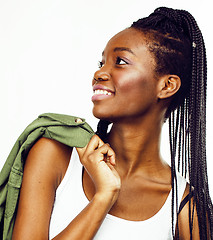 Image showing young pretty african-american girl posing cheerful emotional on white background isolated, lifestyle people concept 