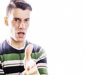 Image showing Portrait of a smart serious young man standing against white bac