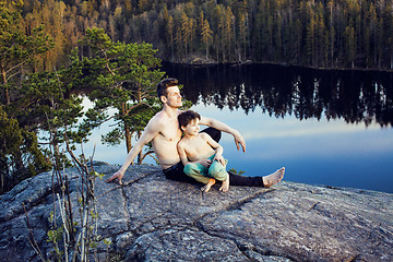 Image showing middle age man with little cute son doing sport yoga on the top of the mountain together, happy family lifestyle people outdoor, summer wild nature for training