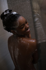 Image showing African American woman in the shower